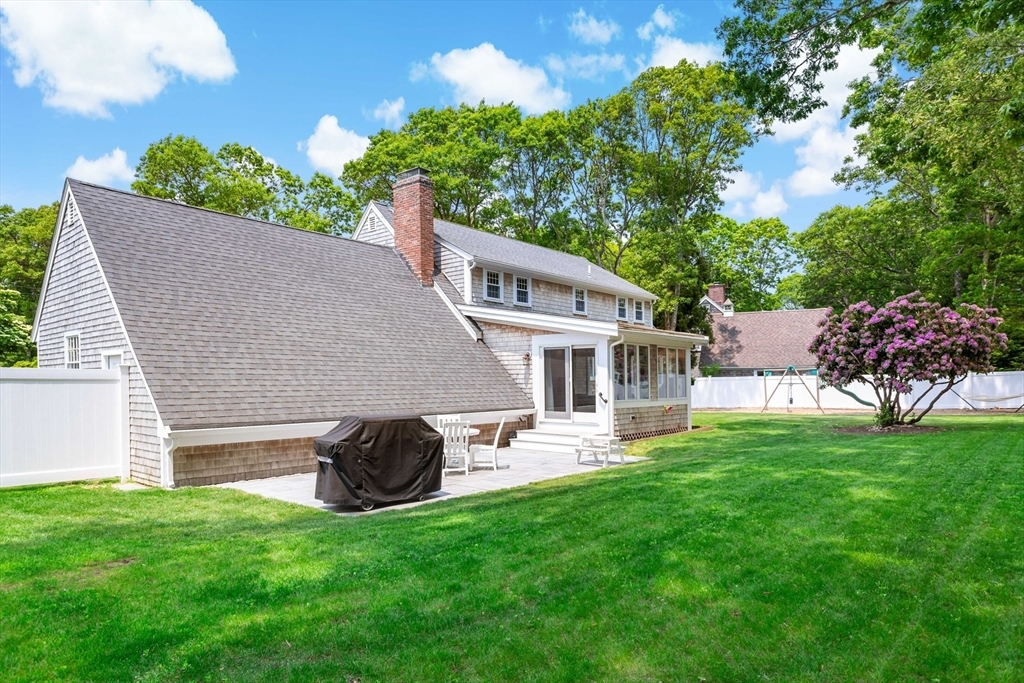 Back of house with patio and grill