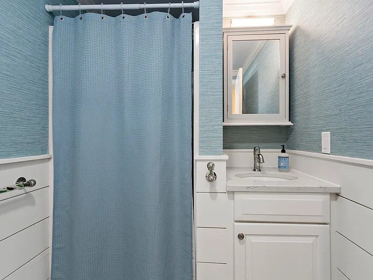 Blue bathroom with shower